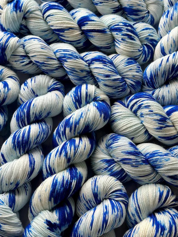 Merino 4PLY sock yarn from James Makes Yarn | Porcelain plates