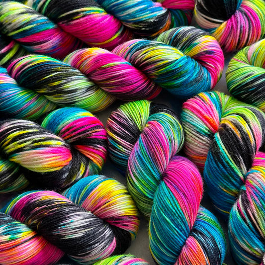 Multicolored yarn skeins in a pile