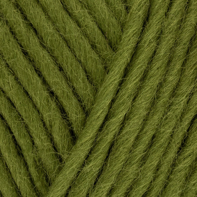 Close-up of green yarn with a skein texture