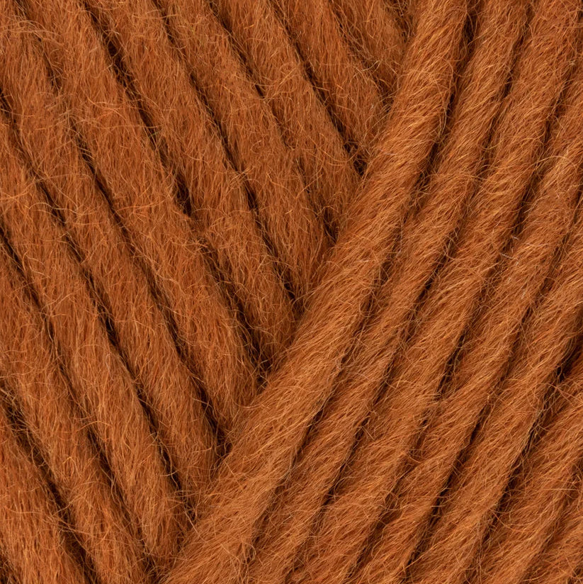 Close-up of brown yarn with visible texture
