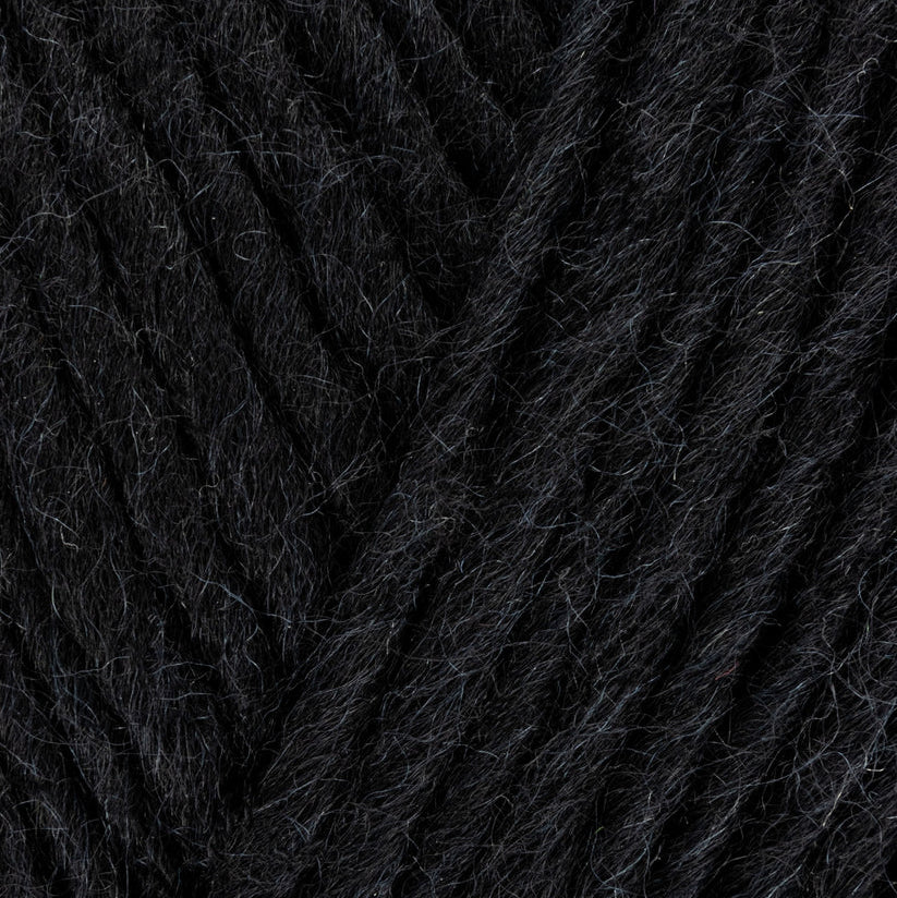 Close-up of black yarn with a textured surface